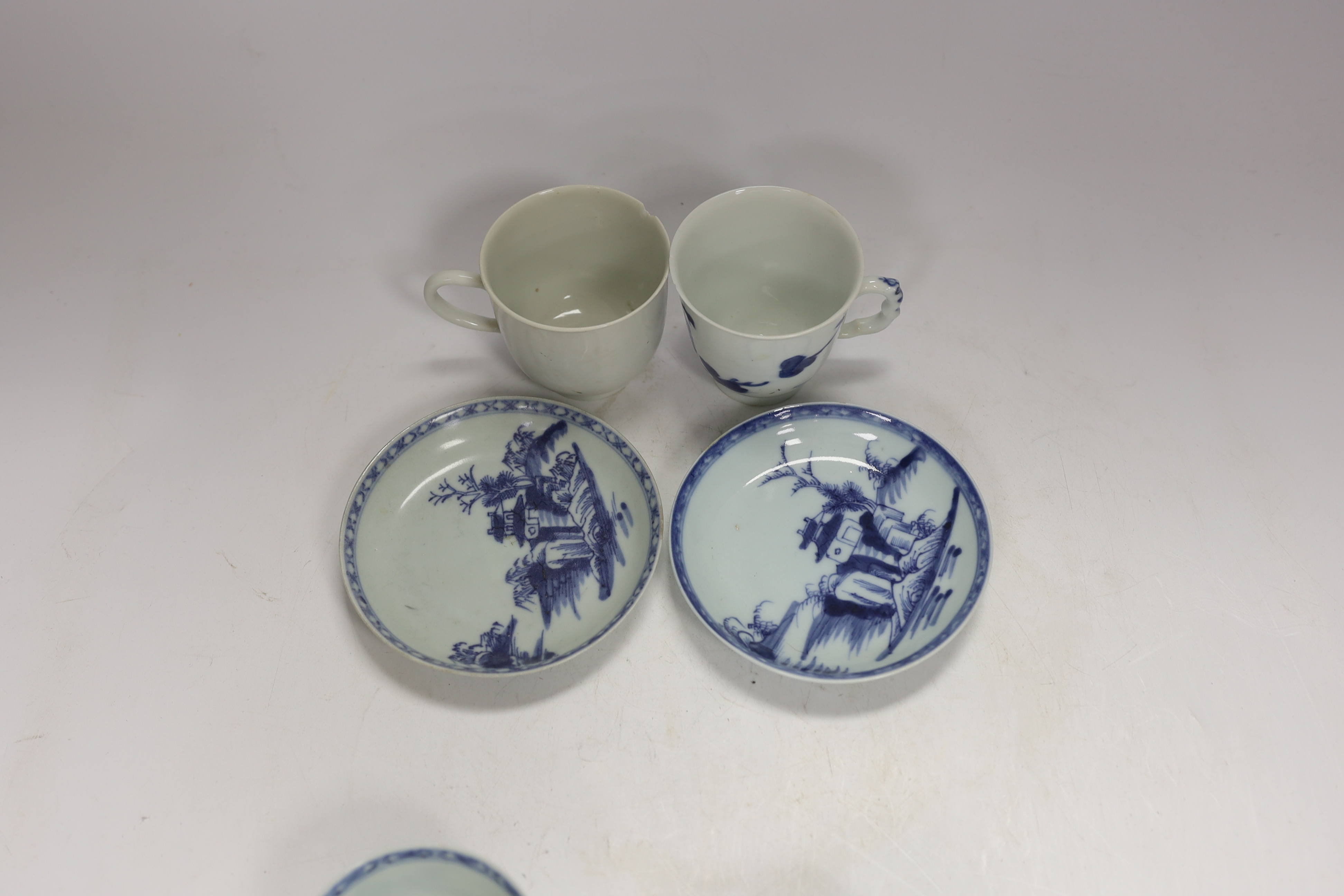 Two pairs of Chinese blue and white Nanking Cargo teabowls and saucers together with two other Chinese tea cups